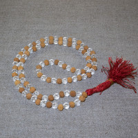 Rosary from white rudraksha and faceted crystal